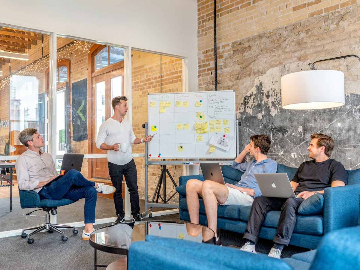 ptslide team working in a bright loft studio